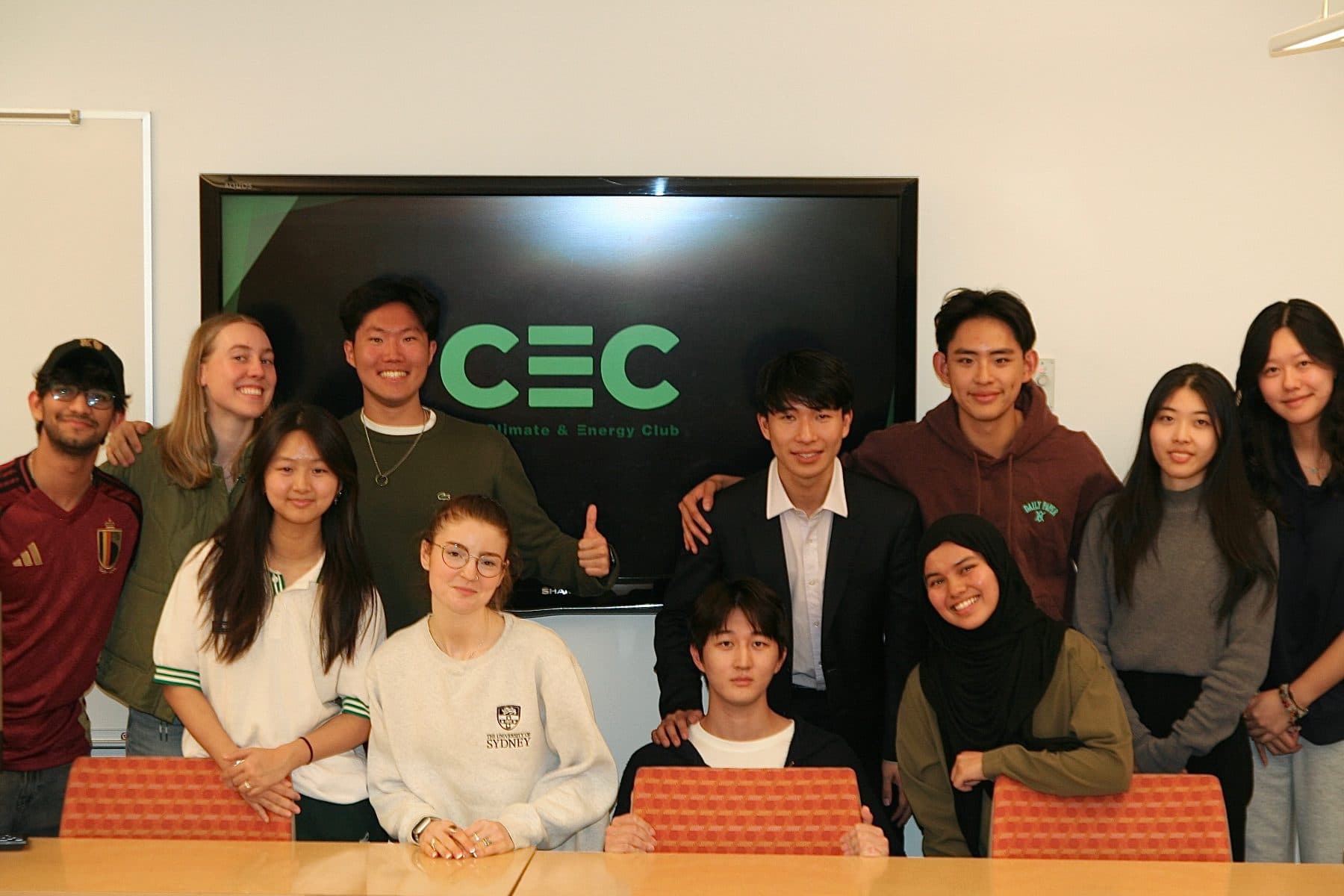 Energy Finance Program cohort in front of the CEC logo